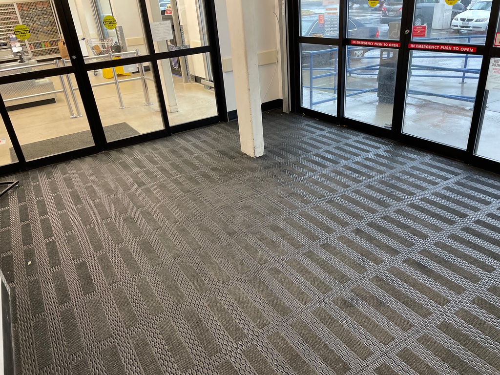 MatShield Pro commercial entrance grid system installed in a retail vestibule